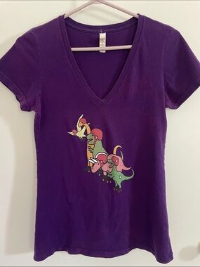 Bella Purple V-Neck Graphic Tee (size med) with roller derby dinosaurs